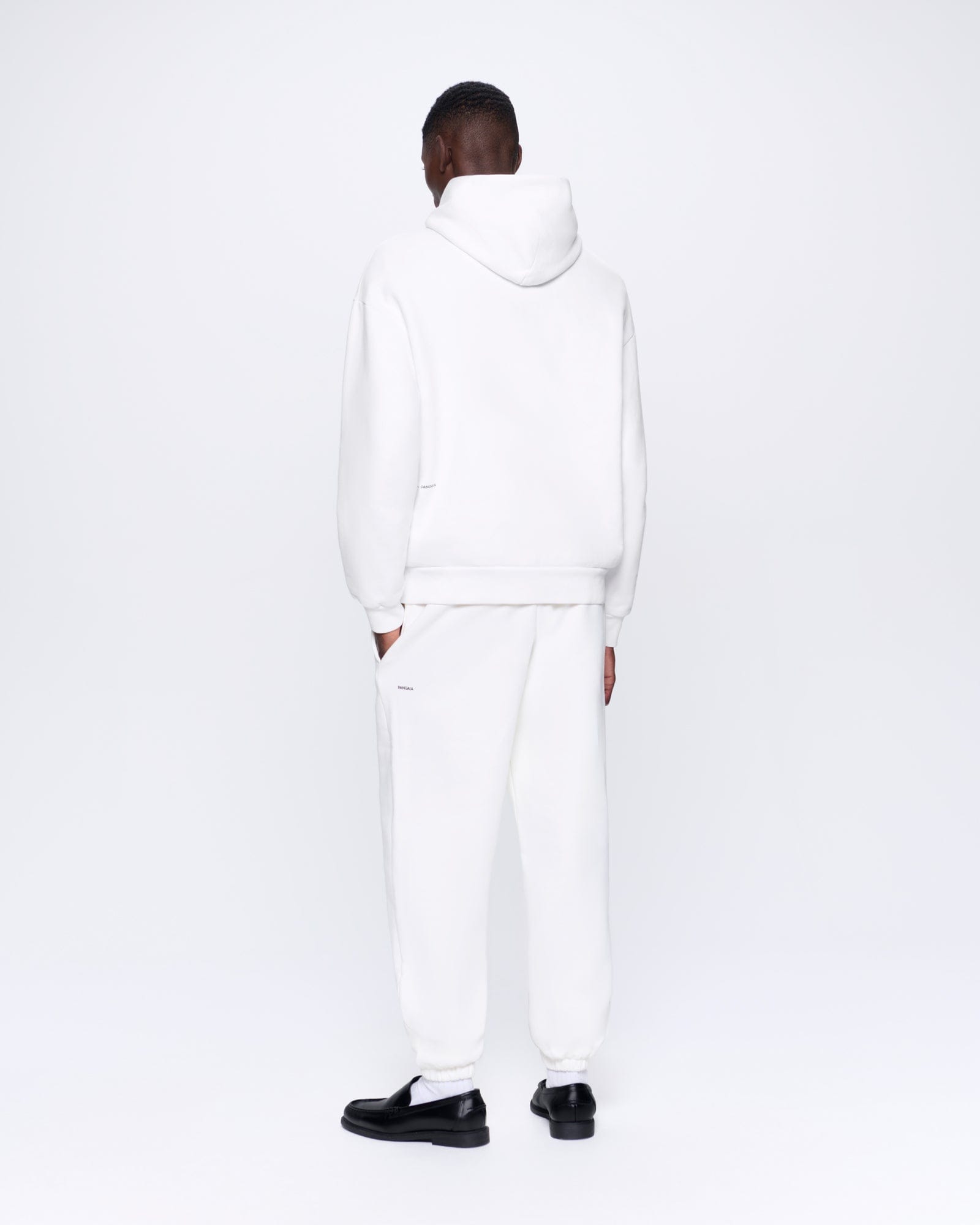 365_HEAVYWEIGHT_TRACK_PANTS_OFF_WHITE_MENS_BACK-MODEL