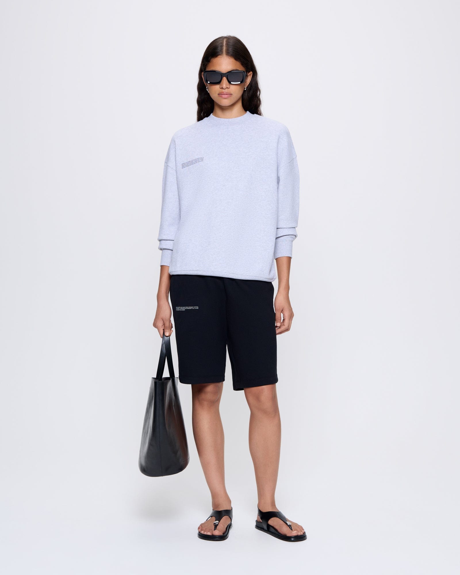 Model wears Womens 365 Midweight Sweatshirt, grey marl, oversized fit, 320 GSM organic cotton crew neck