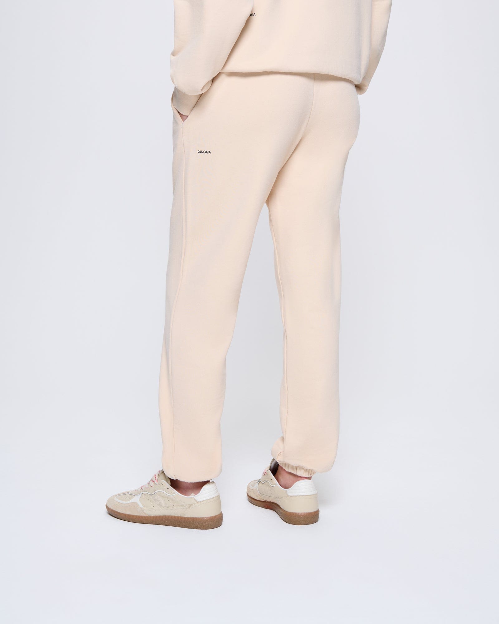 365_MIDWEIGHT_TRACK-PANTS_SAND_WOMENS_BACK-MODEL