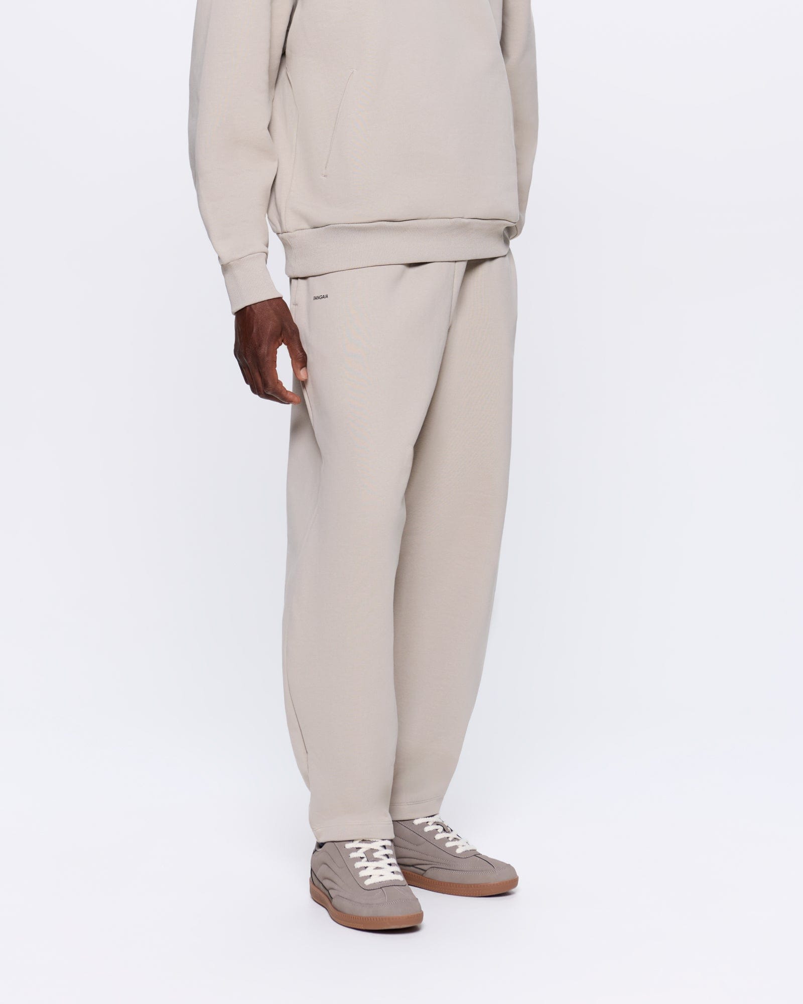 DNA_BARREL-LEG_TRACK_PANTS_STONE_MENS_FRONT