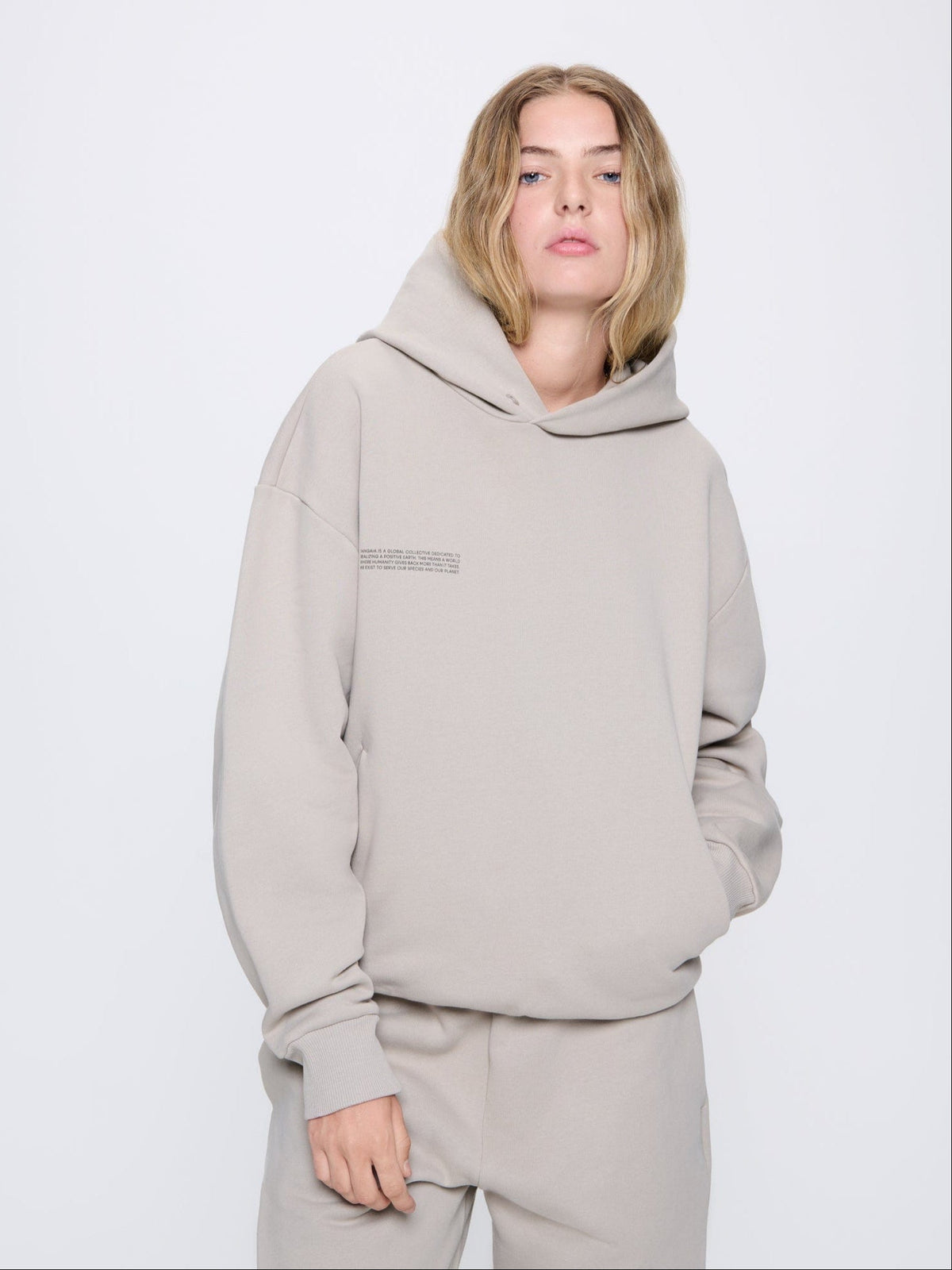 DNA_HOODIE_STONE_WOMENS_FRONT. 