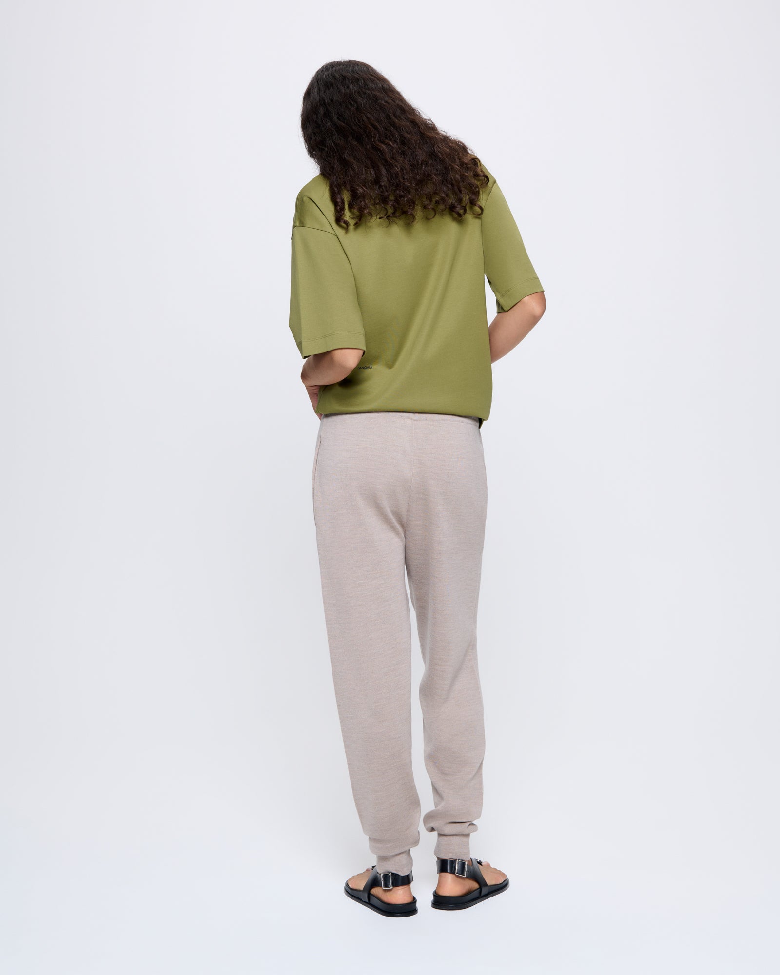 DNA_MERINO-WOOL_TRACKPANTS_STONE-MARL_WOMENS_BACK