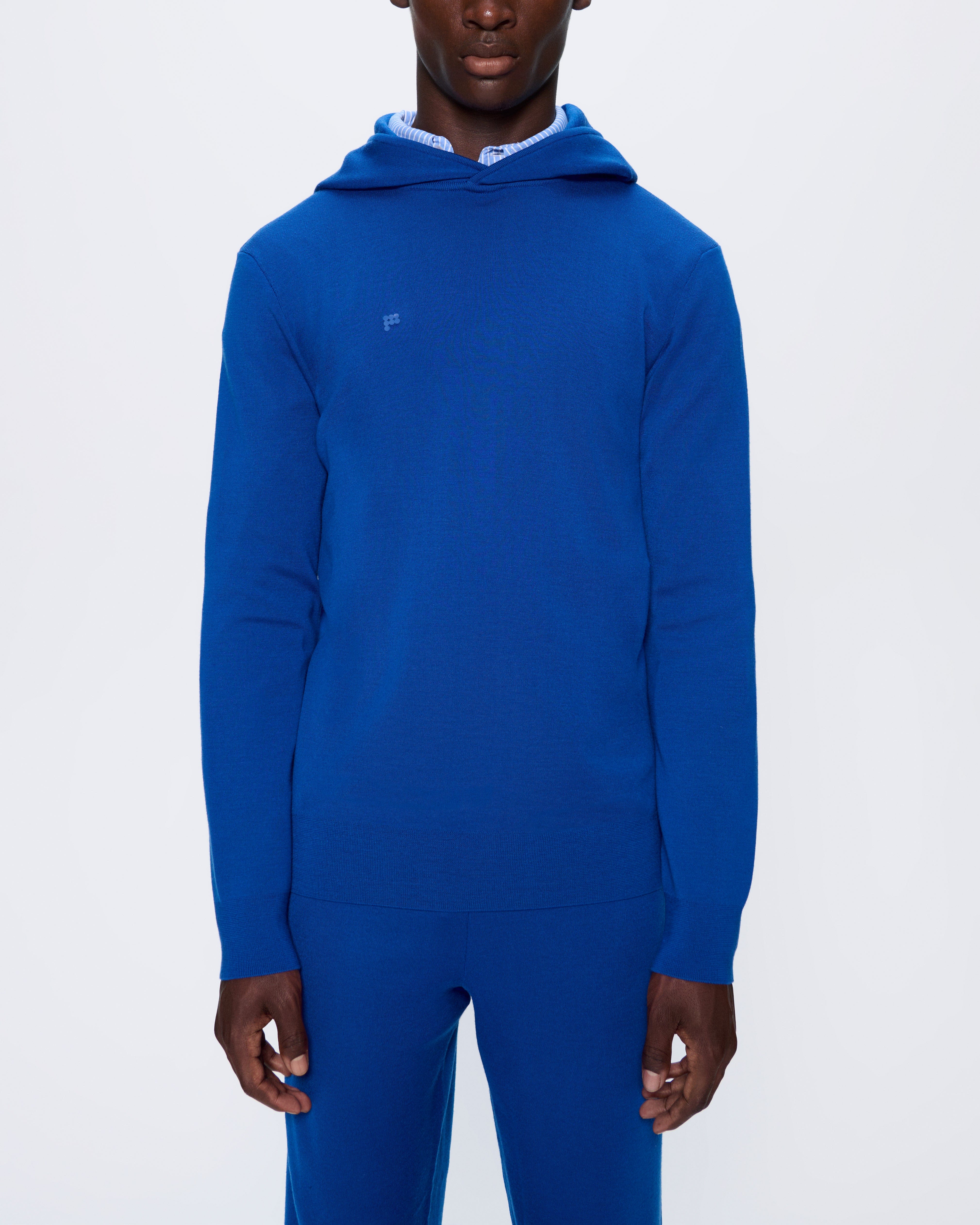 DNA_REGENERATIVE_MERINO_WOOL_HOODIE_EARTH_BLUE_MENS_FRONT