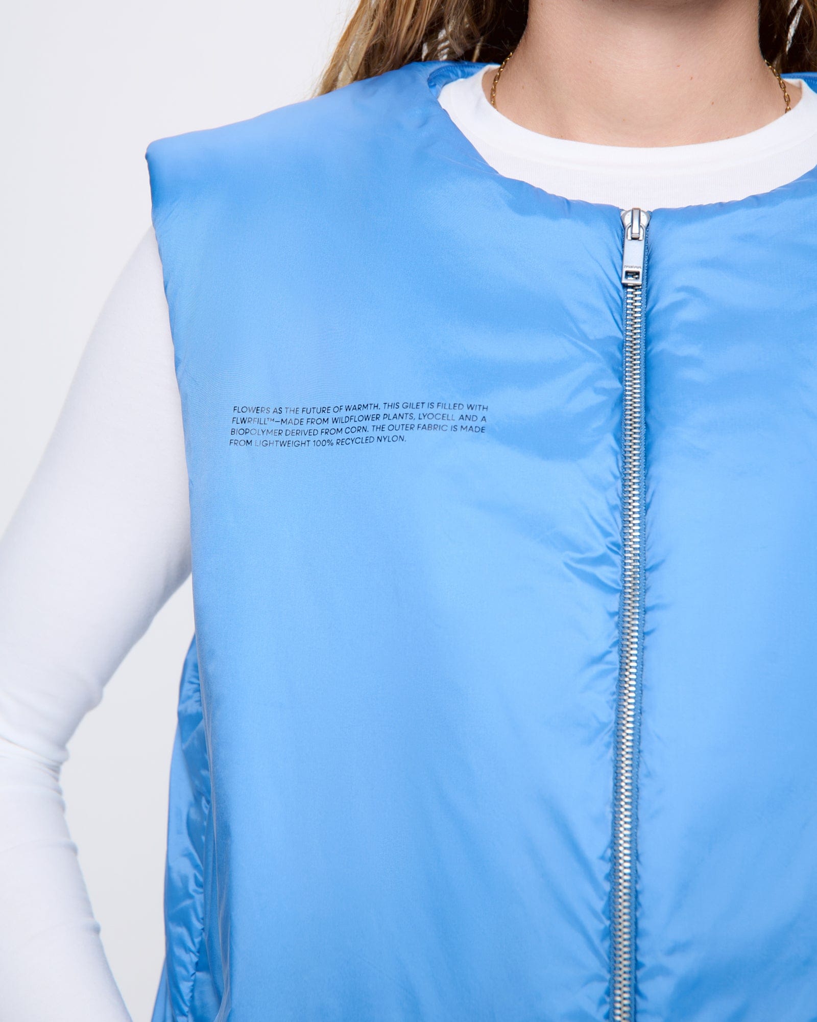 FLOWER-WARMTH_LITE_GILET_SUMMIT-BLUE_WOMENS_DETAIL