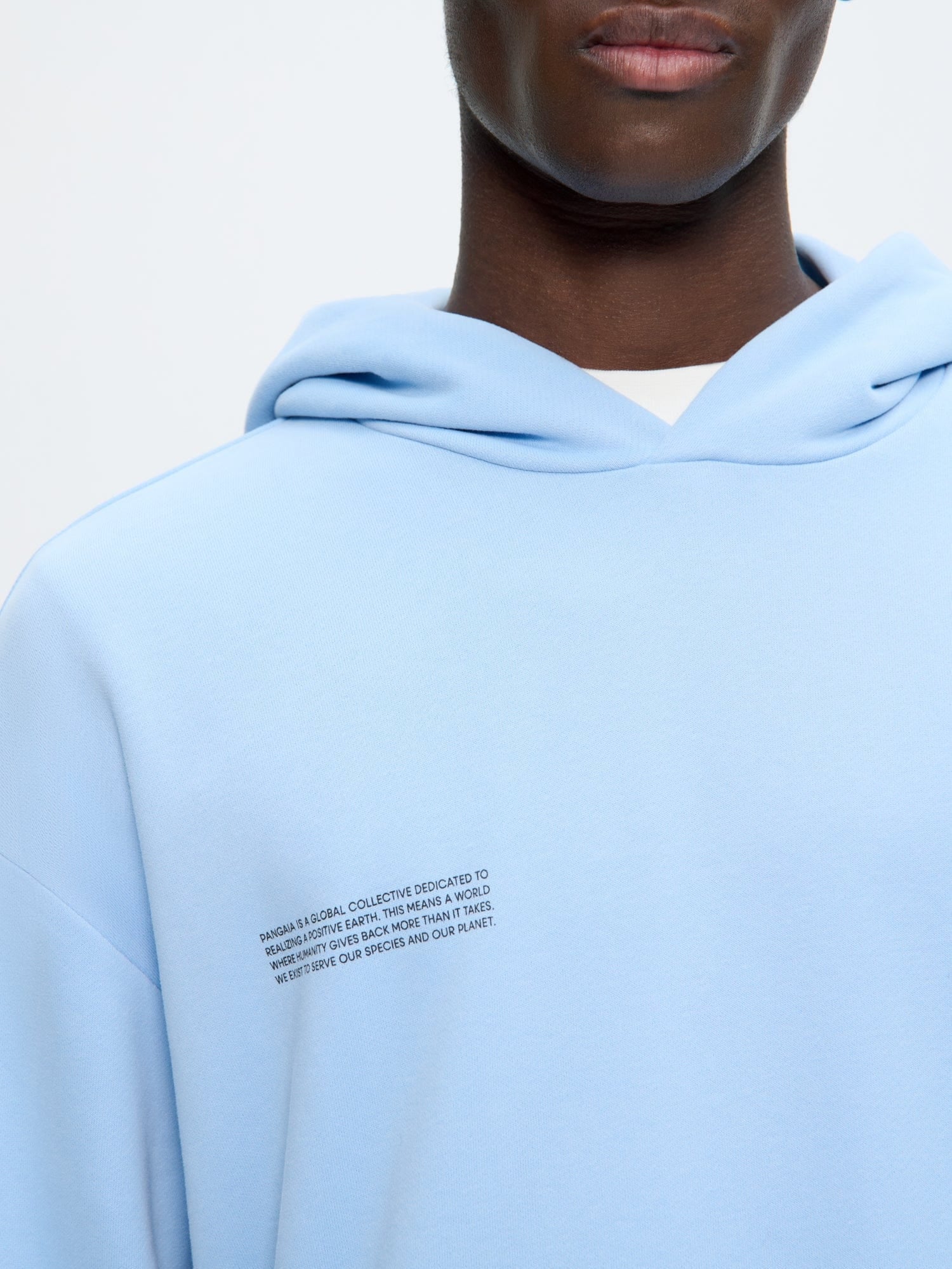 Mens 365 Midweight Dewdrop Blue hoodie, 100% organic cotton, oversized boxy fit, hooded, soft feel on model