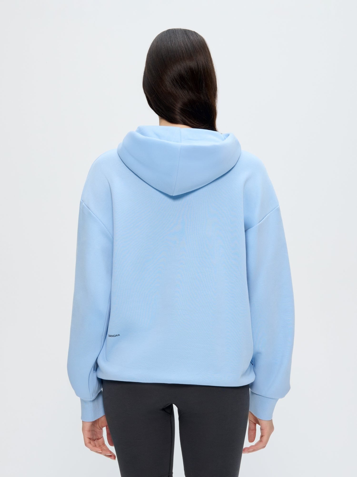 Dewdrop Blue Womens 365 Midweight Hoodie, back view on model. Oversized boxy 100% organic cotton hooded sweatshirt
