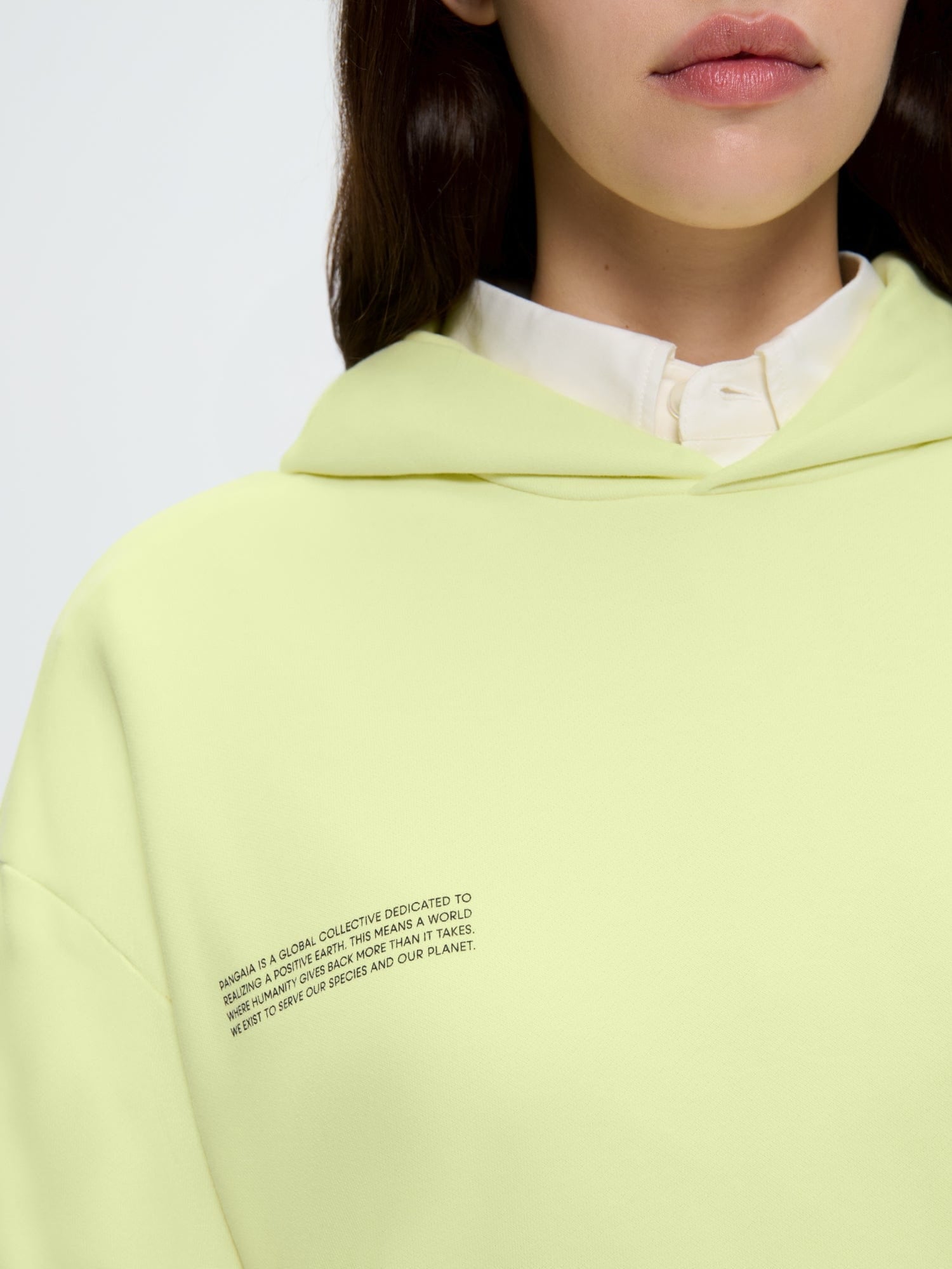 Womens 365 Midweight Hoodie Soft Lime, 100% organic cotton. Model wears oversized boxy hoodie