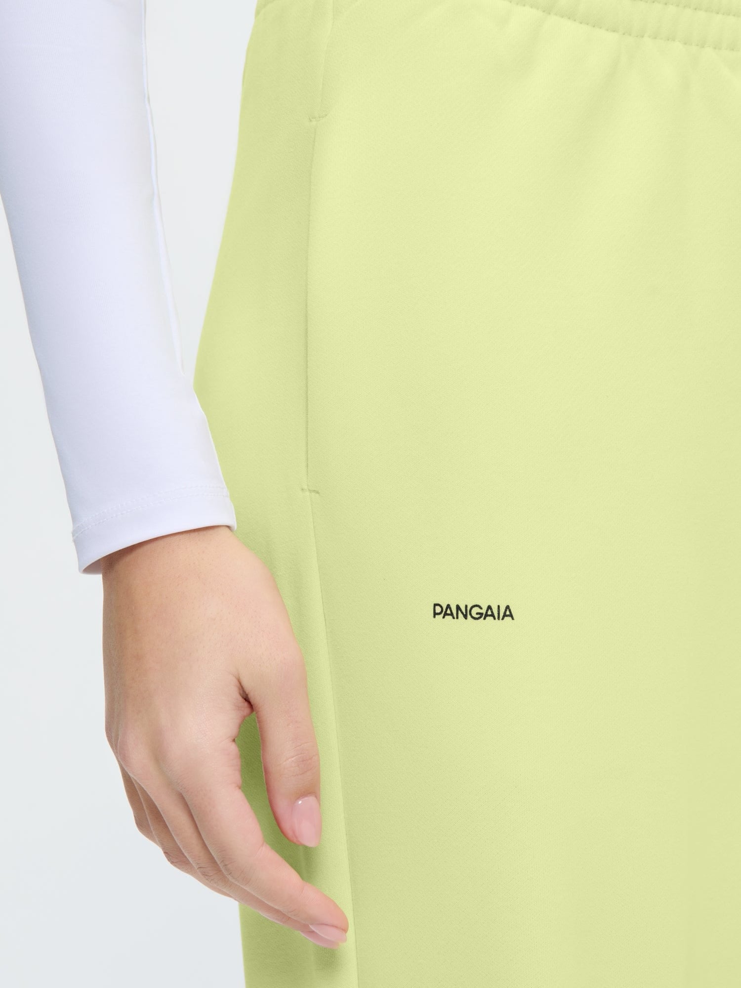 Womens 365 Midweight Track Pants Soft Lime, oversized organic cotton, black Pangaia logo on thigh