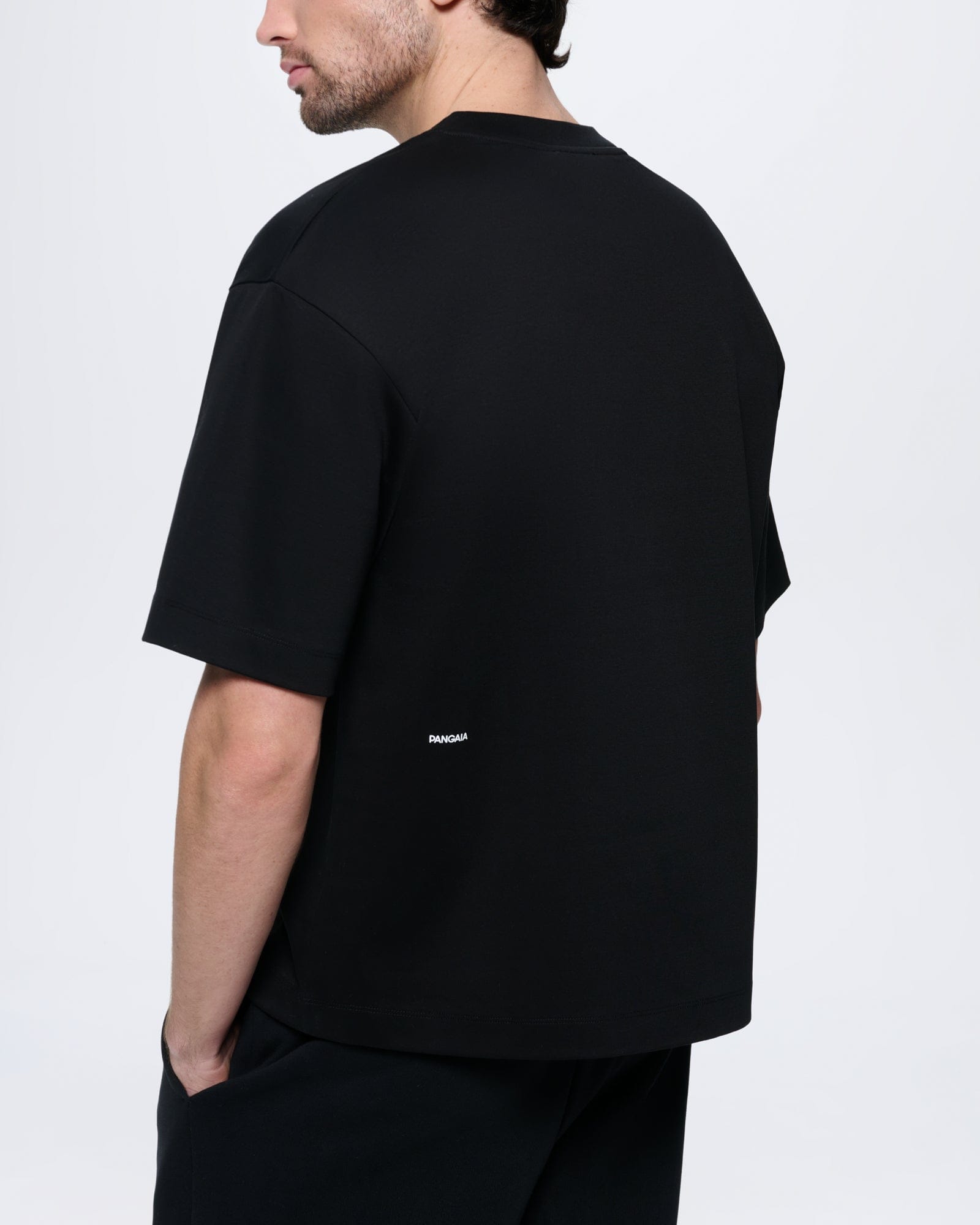 Mens black oversized interlock organic cotton t-shirt with crew neck and PANGAIA wordmark on back