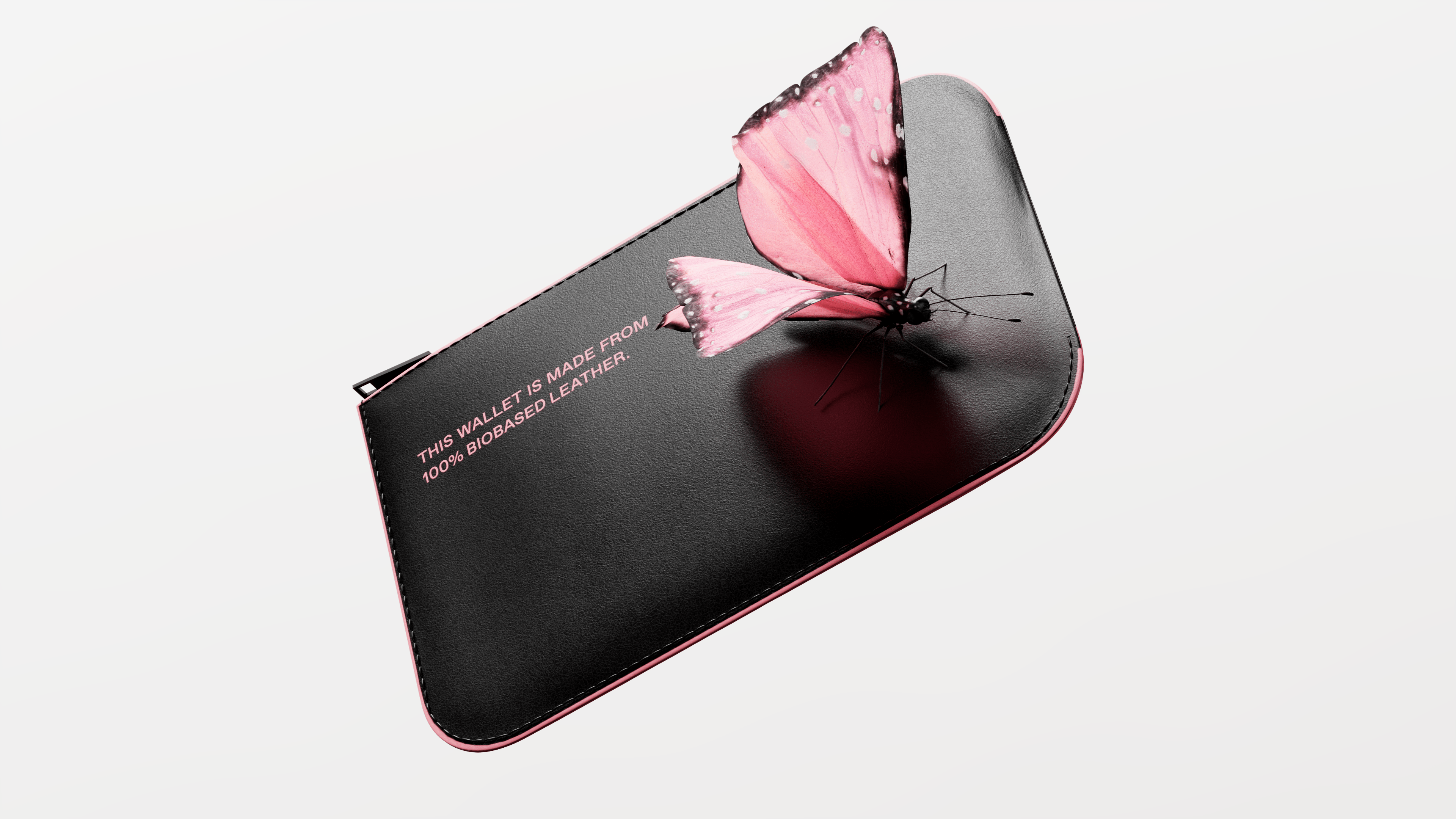 Black biobased leather wallet packshot, pink edge trim, zipper, visible '100% BIOBASED LEATHER' text. Pink butterfly