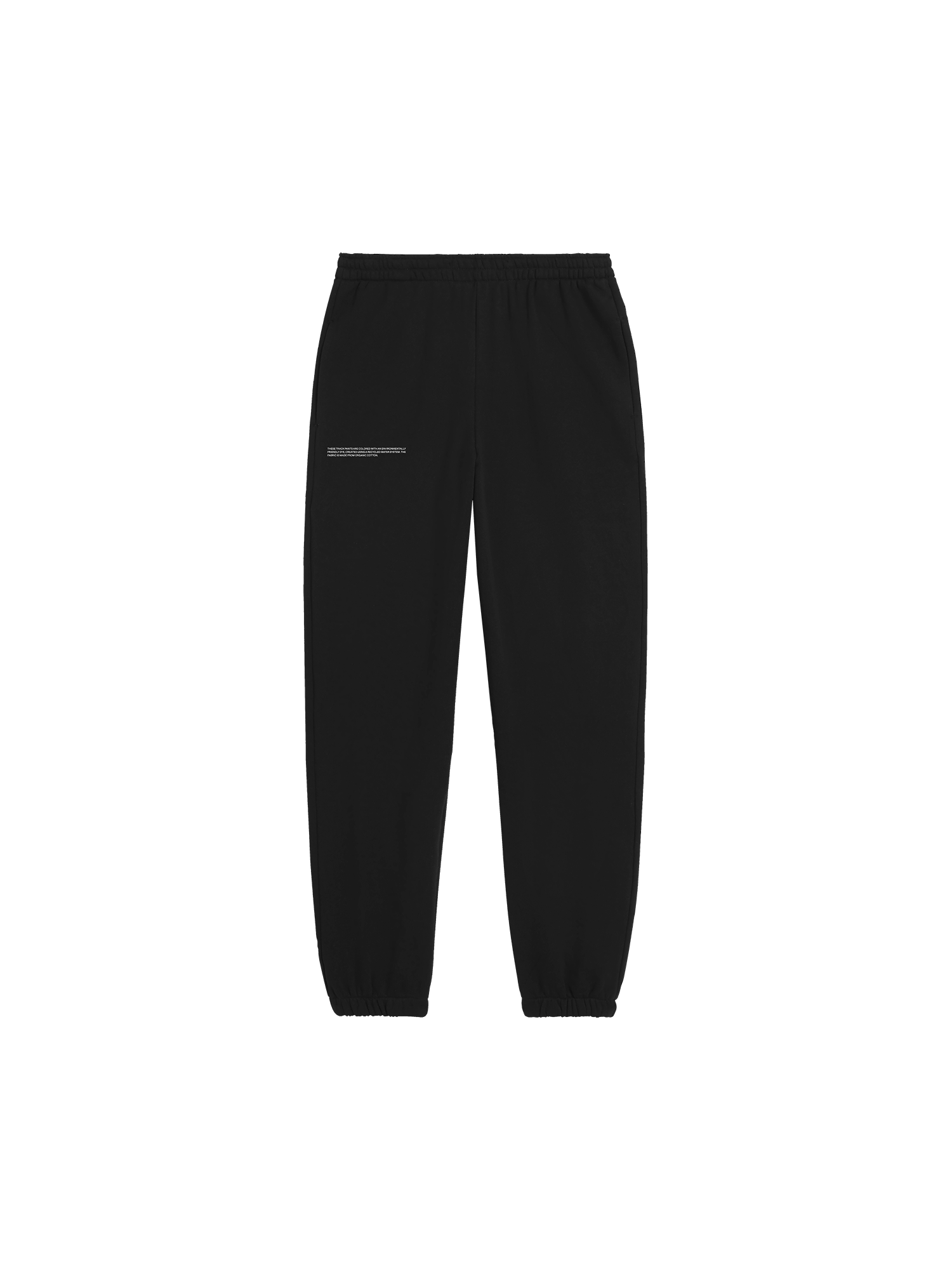 Black organic cotton track pants packshot. Relaxed fit sweatpants with elastic waist and cuffed hem. Premium garment