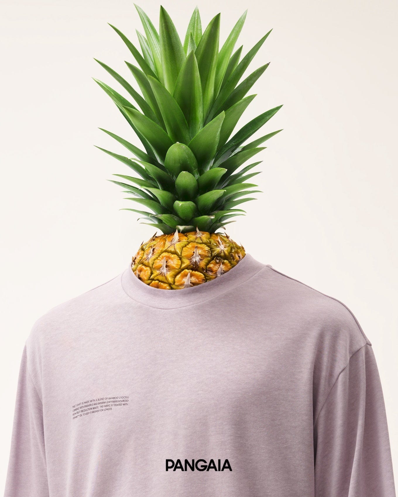 Soft lavender long-sleeve crewneck t-shirt, relaxed fit. Bamboo lyocell, pineapple, banana leaf fiber blend. PANGAIA