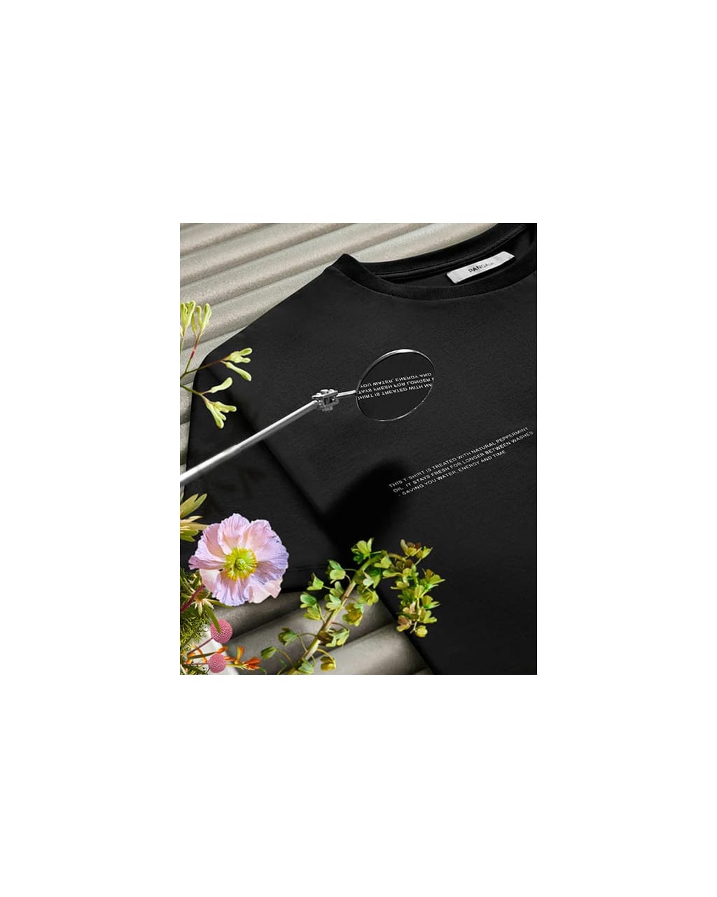 Black Pangaia premium organic cotton crewneck long sleeve t-shirt, soft jersey, white chest text magnified