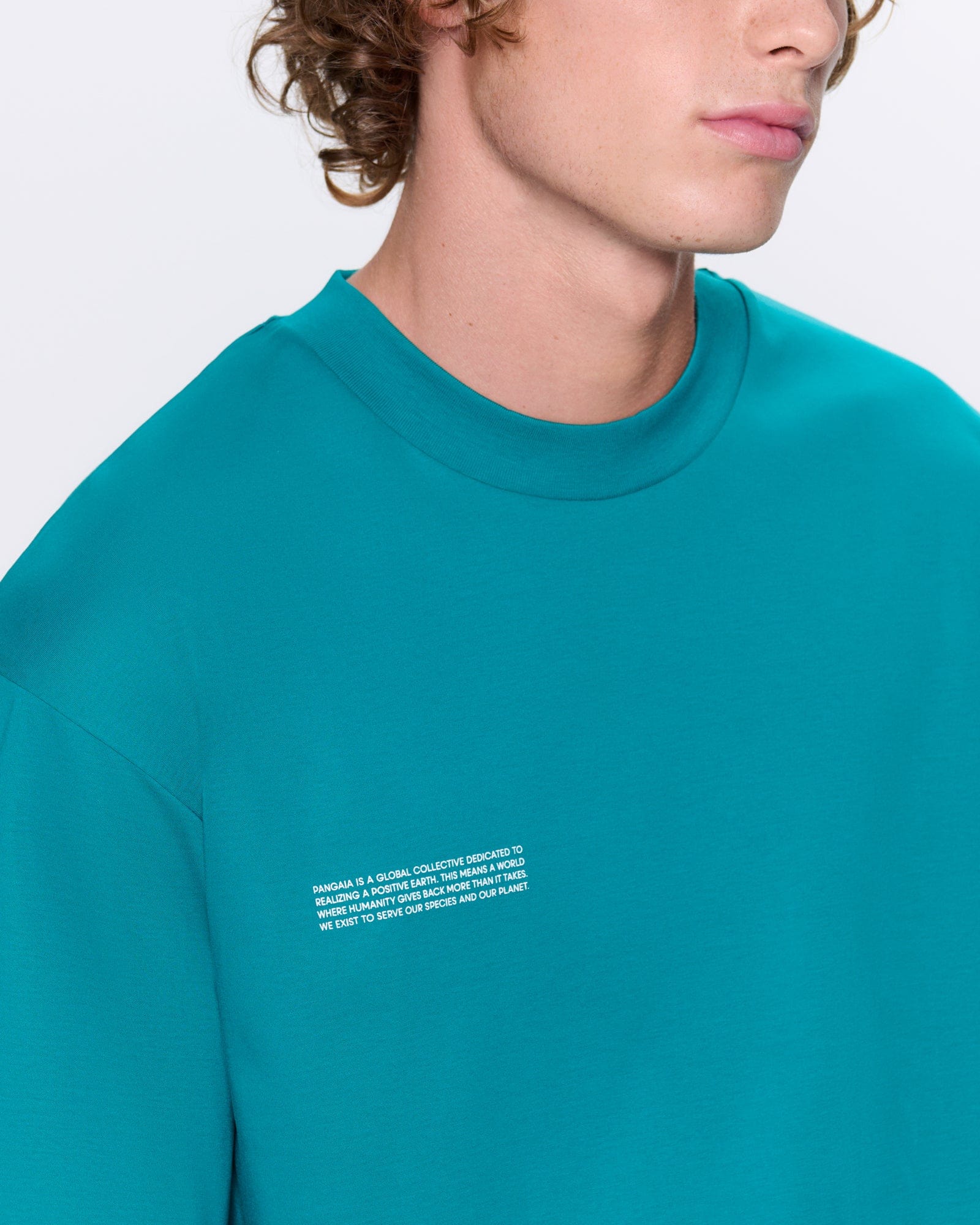 Mens Interlock Oversized Text Block T-Shirt—Malachite Green