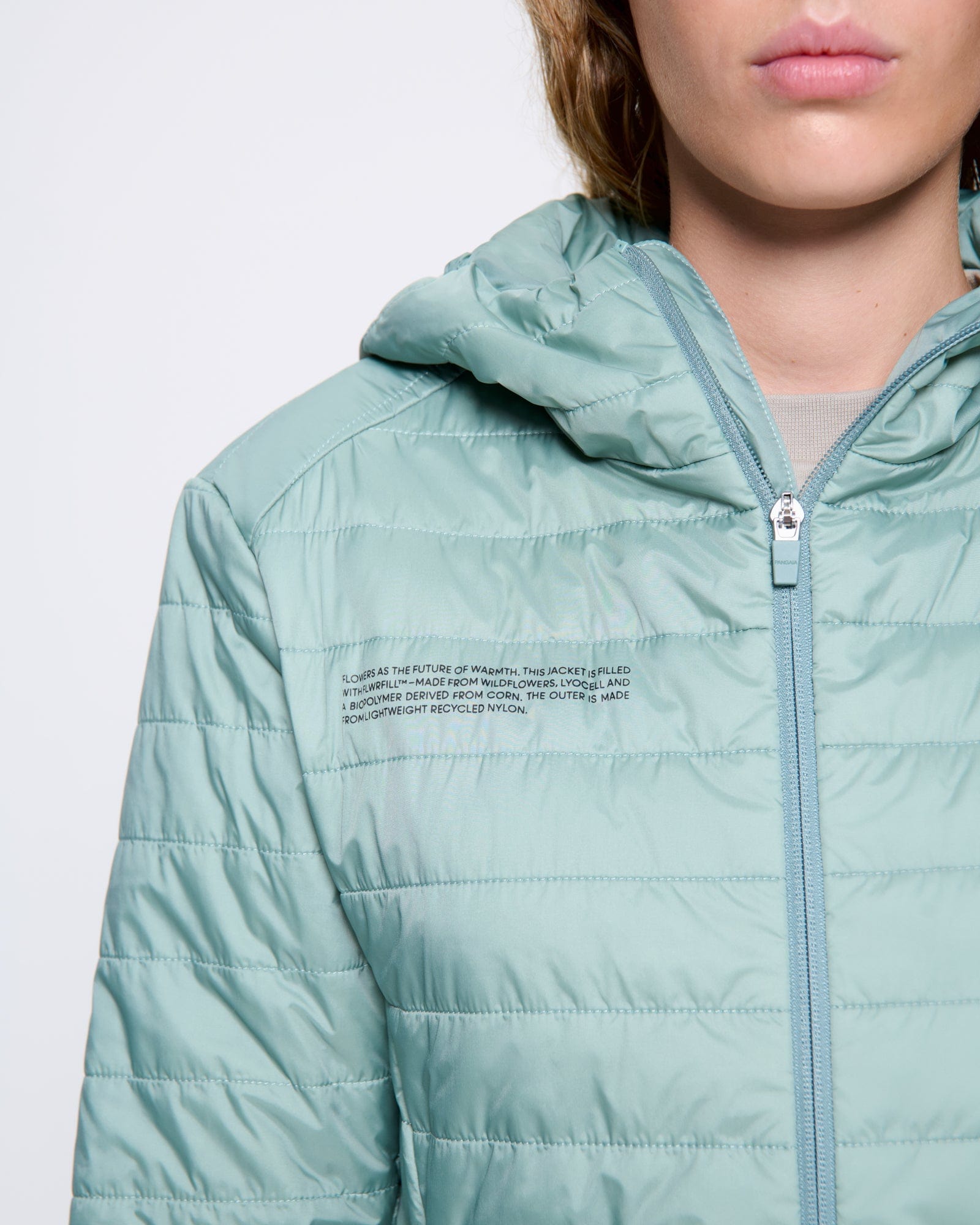 WOMENS_FLOWER-WARMTH_LITE_JACKET_SAGE-GREEN_WOMENS_DETAIL