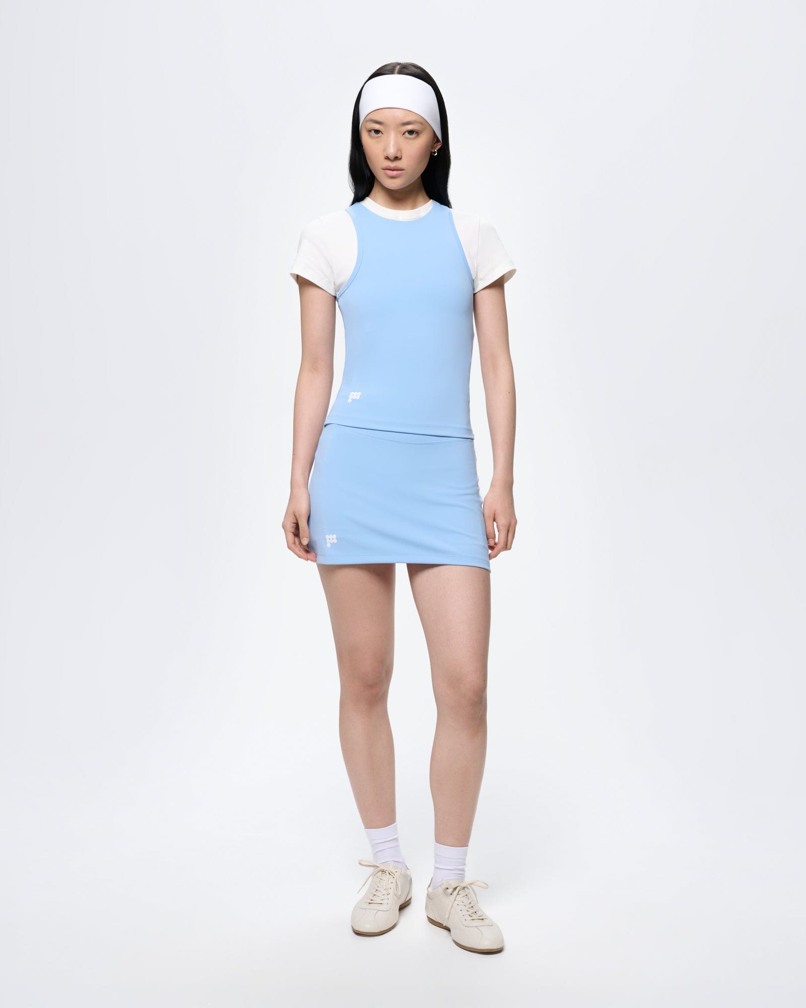Womens Court Side Tank Top Dewdrop Blue, form-fitting sleeveless bio-based nylon elastane performance tank on model