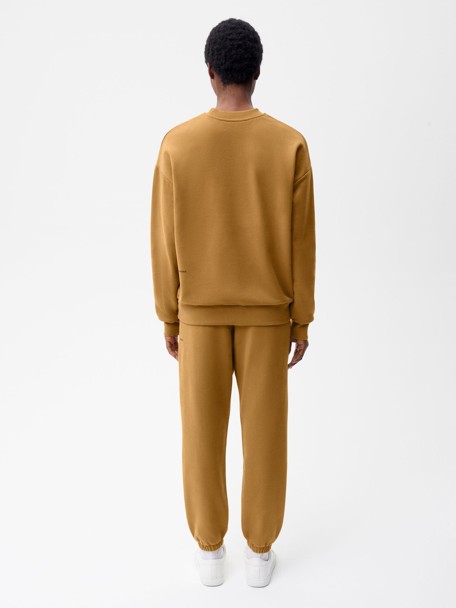 Bronze oversized unisex brushed cotton fleece crewneck sweatshirt & matching joggers set. Relaxed fit loungewear, rear view