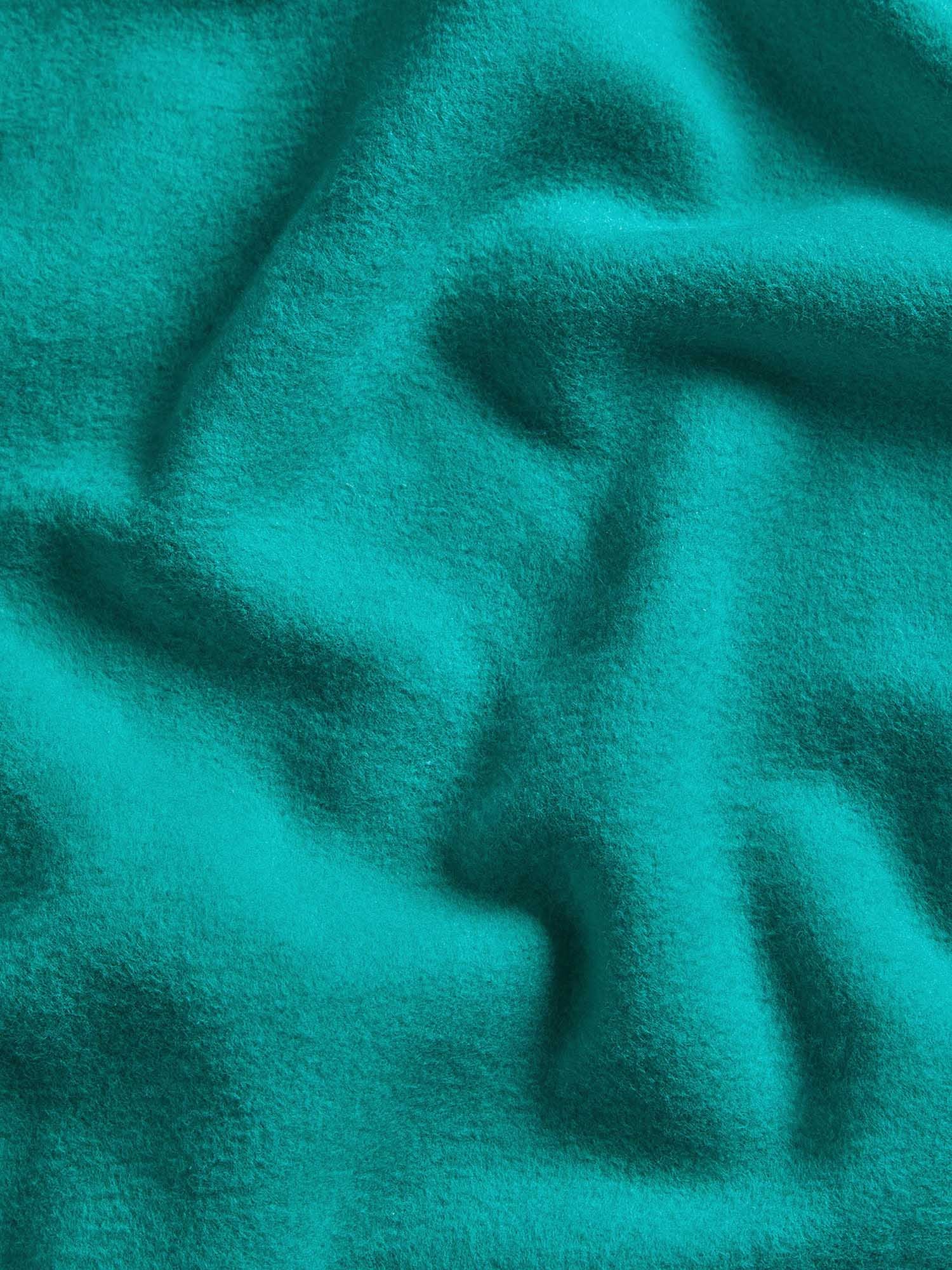 Deep teal soft brushed knit fabric texture packshot. Premium textile material detail