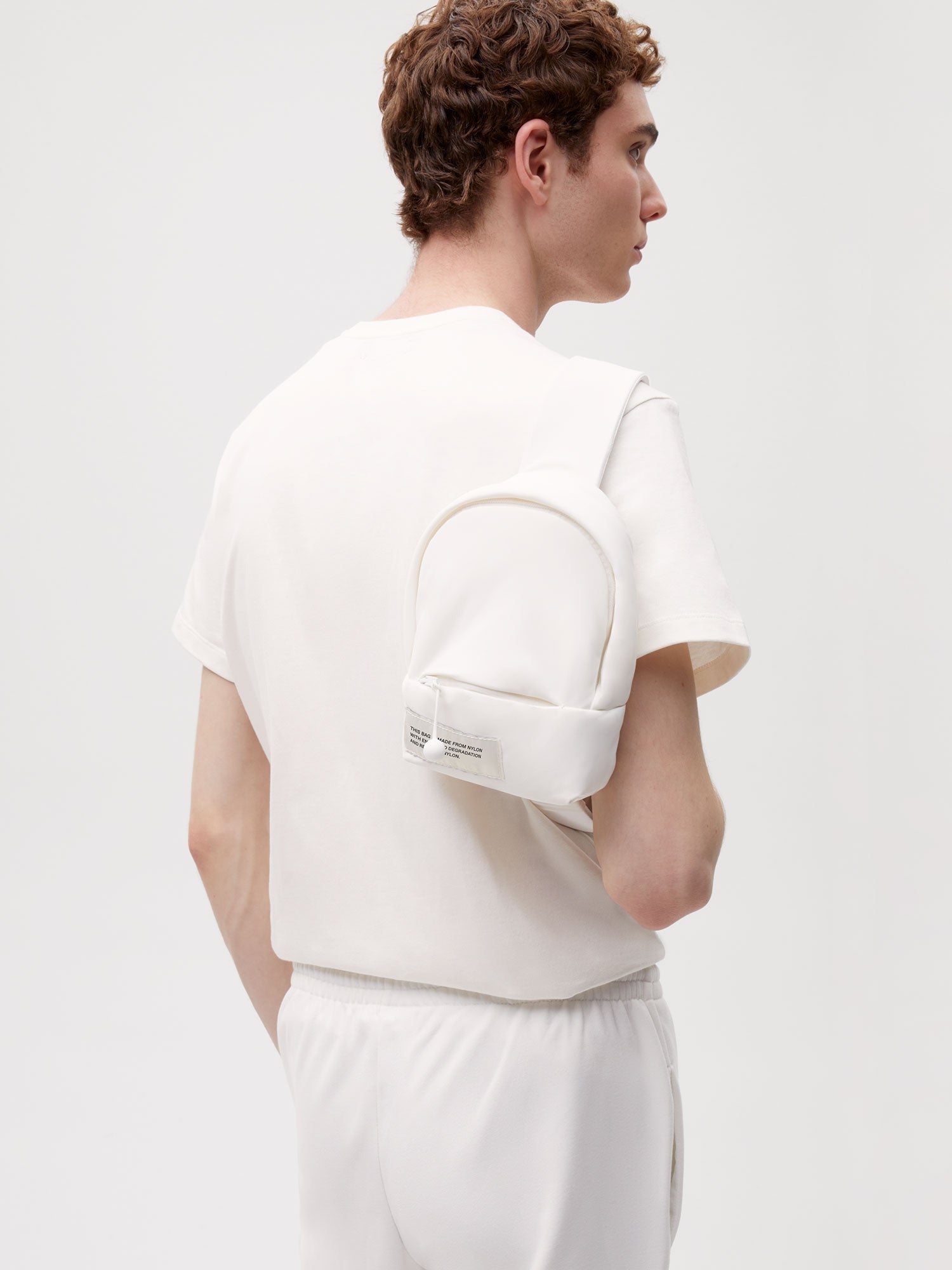 ASOS DESIGN padded nylon crossbody bag in tiger print - ShopStyle