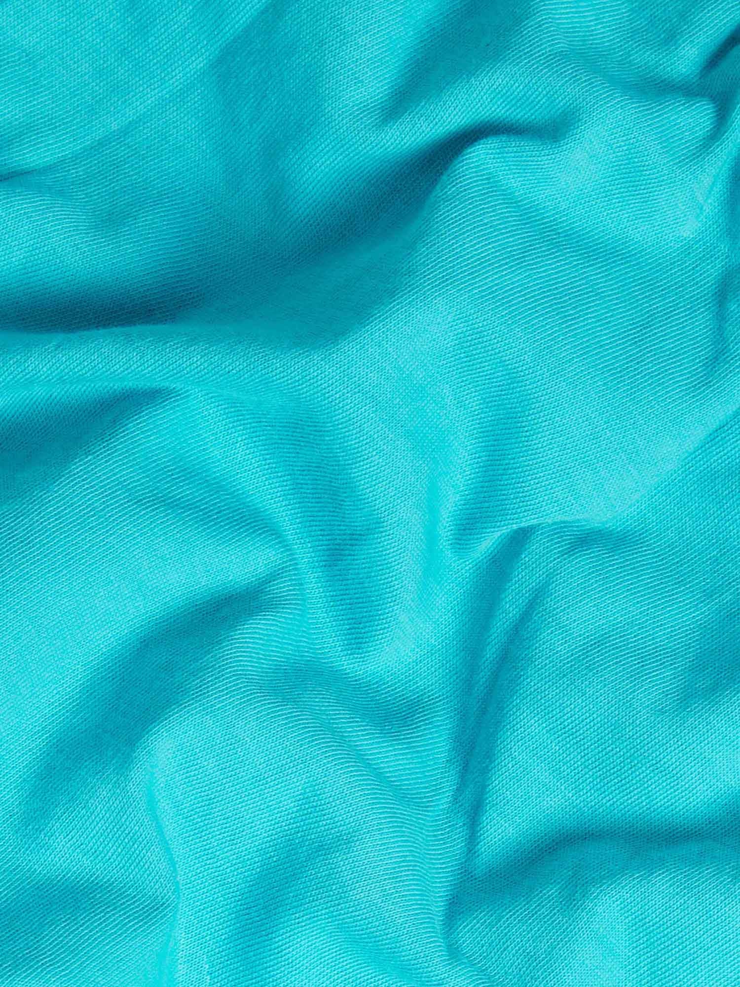 Vibrant turquoise blue textured fabric packshot. Premium soft textile, close-up detail of fine weave material