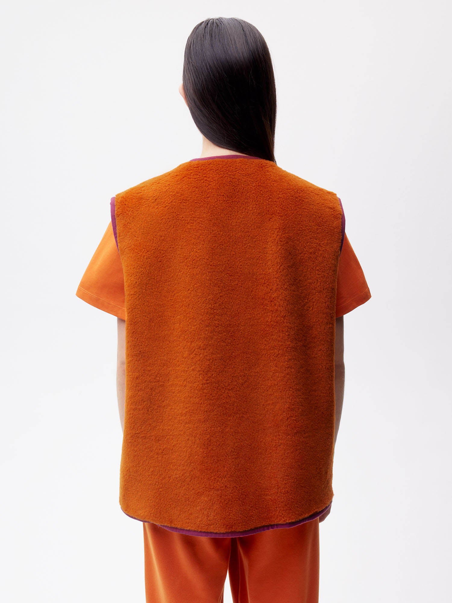 Recycled Wool Fleece Gilet—cinnamon orange female
