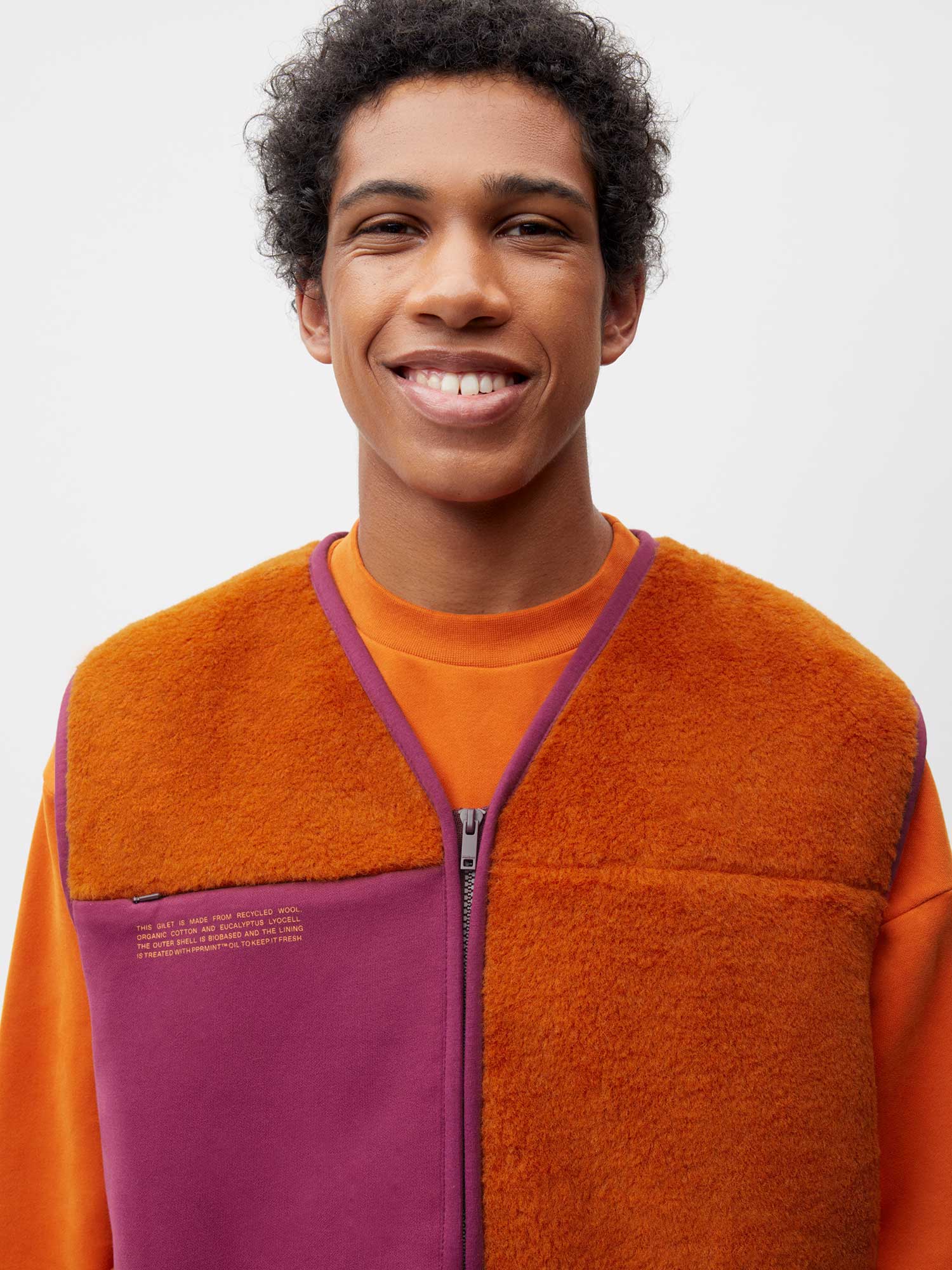 Recycled Wool Fleece Gilet—cinnamon orange male