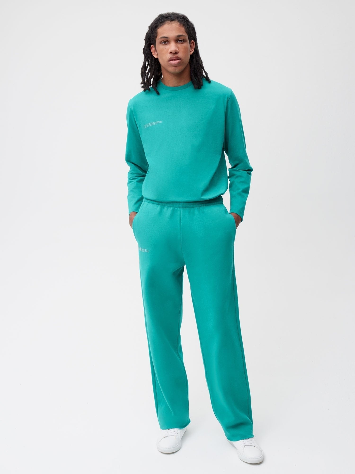 Premium men's dark turquoise long-sleeve crewneck sweatshirt and wide-leg sweatpants set. Relaxed cotton loungewear